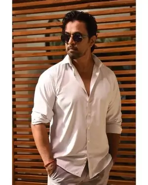 Arjun Sarja Physical Appearance