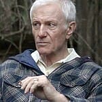 Raymond J Barry